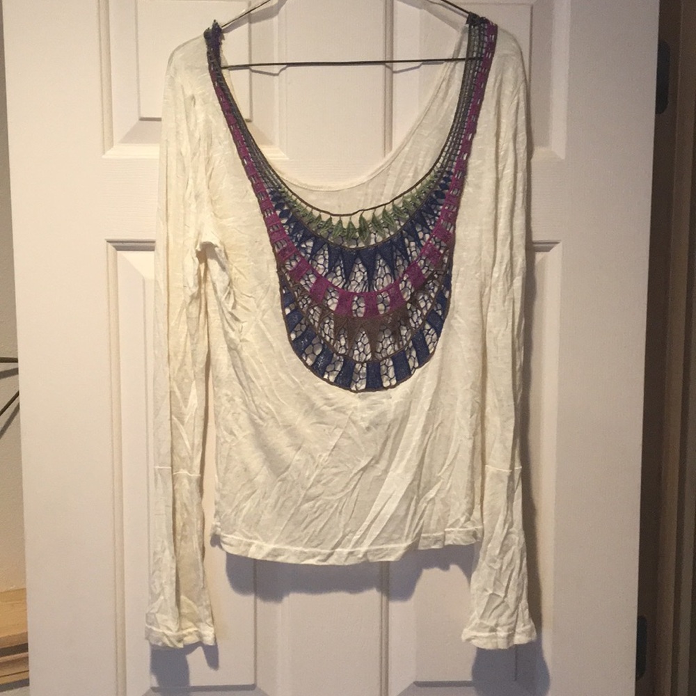 Crocheted open back long sleeve shirt